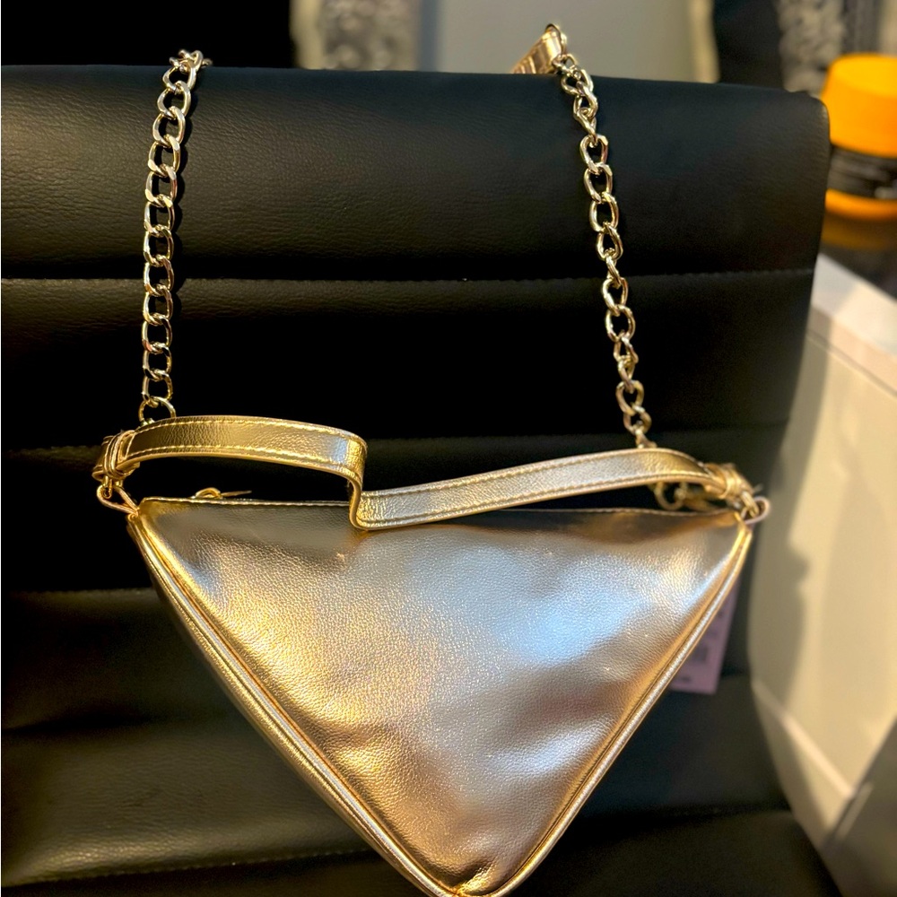 Wild fable (target brand) chained gold triangle purse.